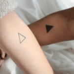 What do the Triangle Tattoos mean