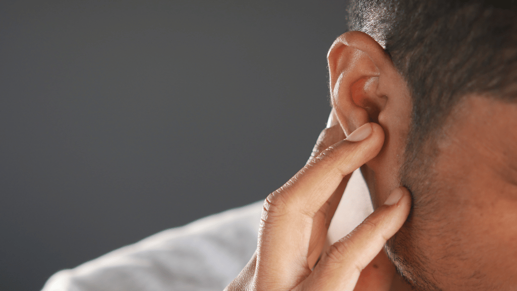 Minimizing pain for ear tattoos