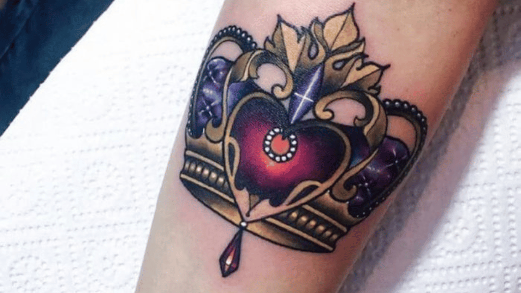What does a crown tattoo mean