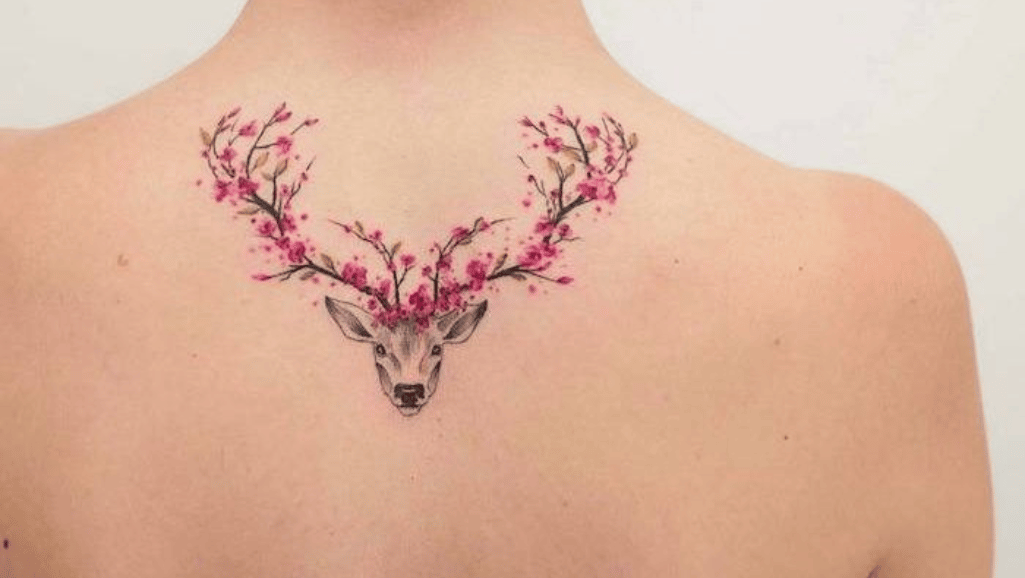 Female Singer has a Deer Tattoo